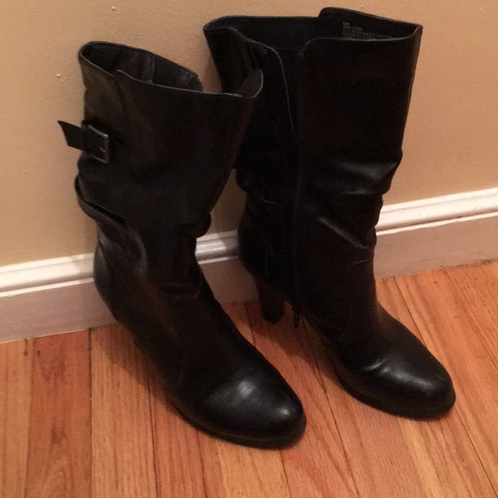 Black high heeled boots size 9